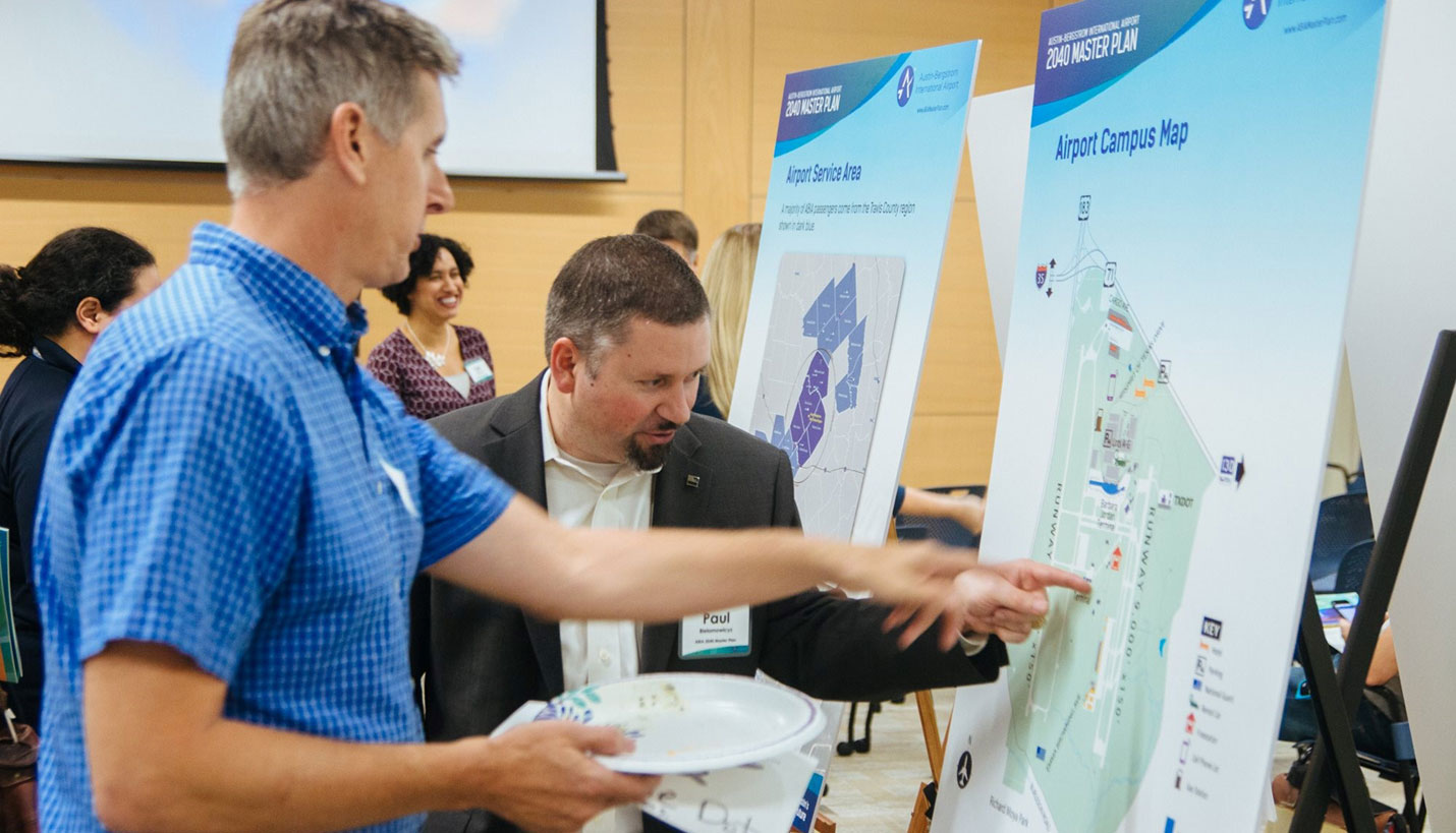 A member of the community asks a question of Page Senior Project Manager Paul Bielamowicz, who led the firm on the East Infill expansion of the Barbara Jordan Passenger Terminal. - ABIA 2040 Master Plan Project Team