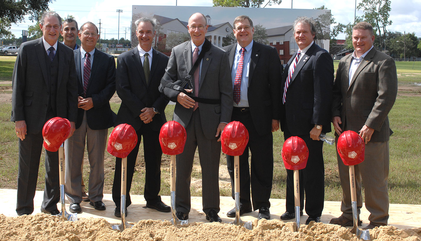 (L-R) Jeff Bricker, Page Principal in Charge; Hector Moreno, Hill International Program Manager; Cruse Melvin, Lamar University VPFO; Aaron Jones, Page Project Manager; Kenneth Evans, Lamar University President; Peter Graves, Texas State University System Vice Chancellor for Contract Administration; Rob Roy Parnell, Texas State University System Associate Vice Chancellor for Facilities; Jerry Vandervoort, Spaw Glass Project Executive. - 