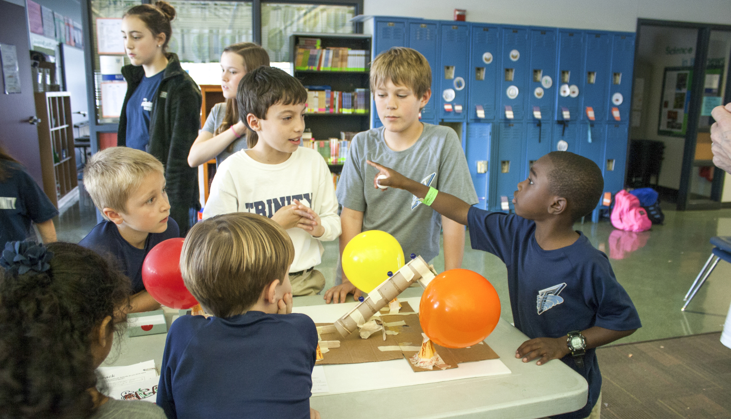 Trinity Episcopal students share their finished STEAM project with each other. - Page