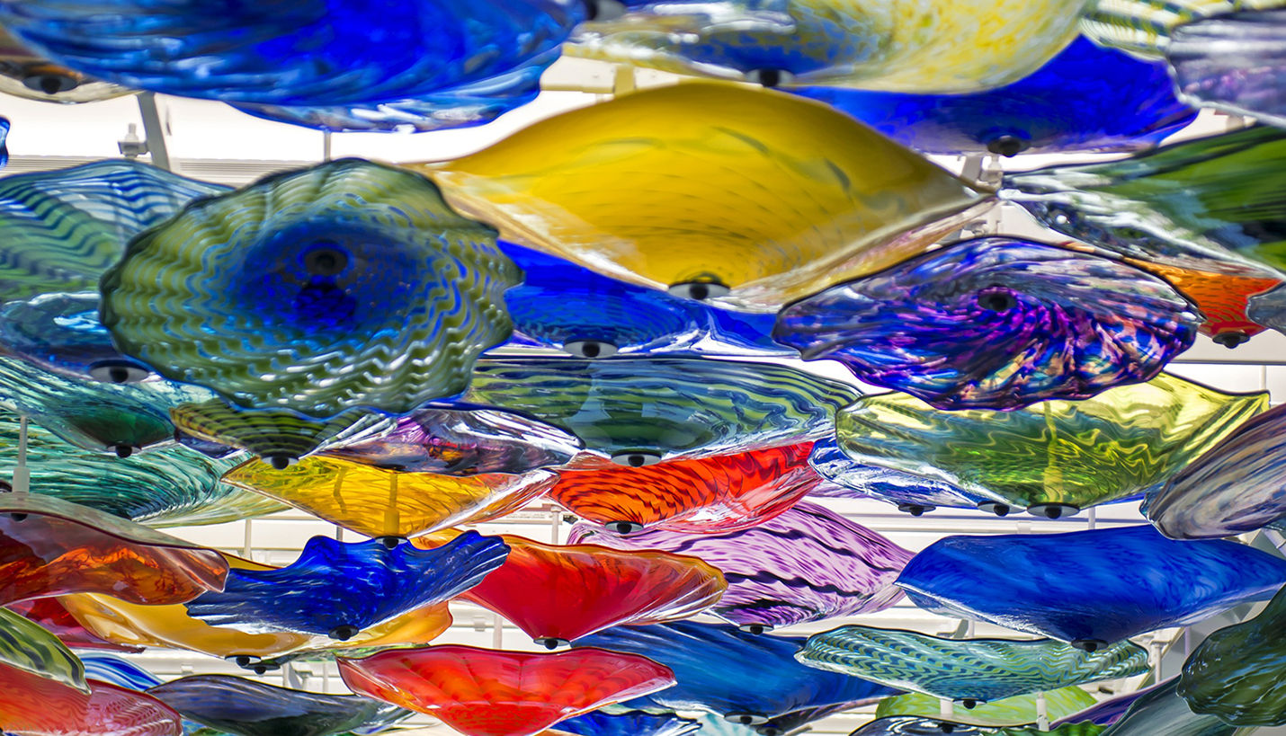 Look up for a little inspiration! The ceiling at our Saint Francis Health System in Tulsa, OK is covered with these beautiful sculptures by Glasslight Studio. #pagethink #design #interiors #art - © Eric Cucciaioni