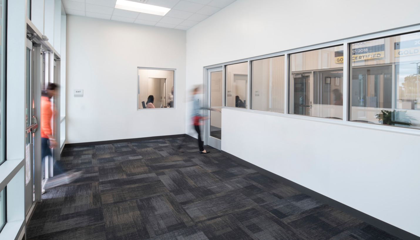 Houston ISD High School for Law and Justice includes two security vestibules with adjacent security office to monitor and control entry. - © Mariella & Luis Ayala