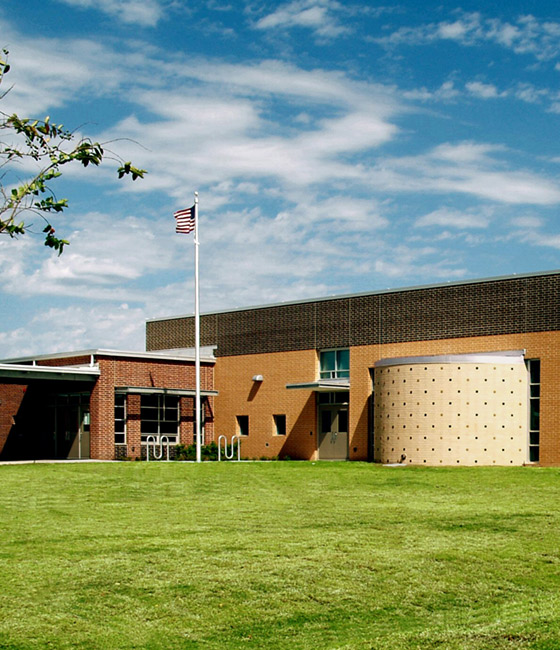 Page designed an Austin ISD elementary school to accommodate PreK - 5 students and their dining, phy